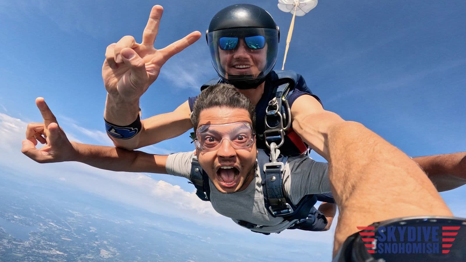 Sujan Ghimire in freefall during a tandem skydive with an instructor.